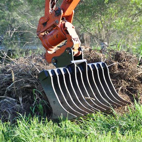 root debris rake skid steer attachment|used root rakes for excavators.